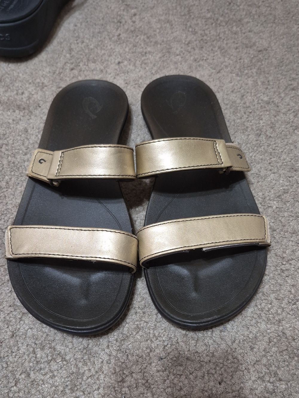 OluKai Gold and Black Two-Strap Slide Sandals